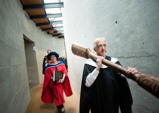 faculty getting ready for graduation ceremony