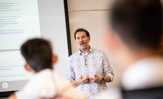 A picture of John Vigna teaching