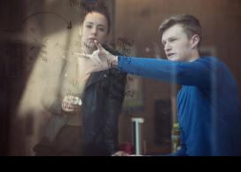 Teaching and learning together with equations on a glass window