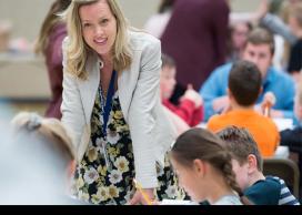 Staff helping children