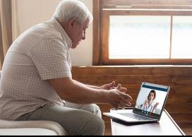Man with diabetes using computer