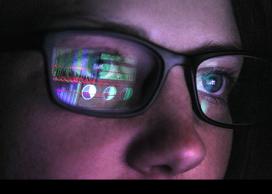 Person looking at laptop 