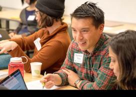 New faculty member in group discussion