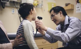 Doctor testing young patient for allergies