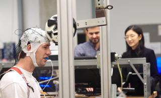 Person wearing electroencephalography sensors